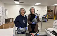 D.L. Evans Bank employees packing food boxes for The Idaho Food Bank.