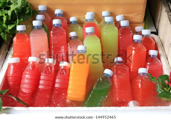 mixed-ice-cold-juice-bottle-600w-144952465.webp