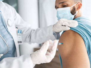 Patient receiving a seasonal flu vaccine at a healthcare clinic