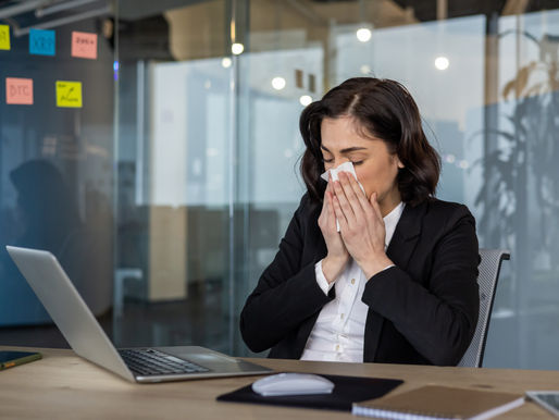 Person experiencing returning symptoms after recovering from an illness