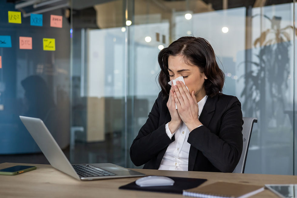 Person experiencing returning symptoms after recovering from an illness