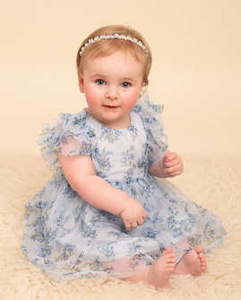 Baby sitter portrait included within a family photography gallery in Derbyshire