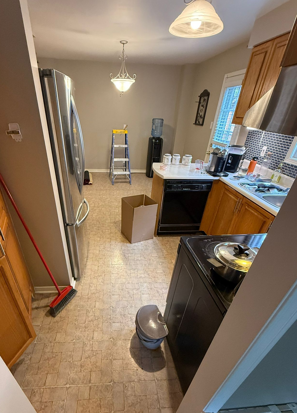 Different angle full kitchen view before