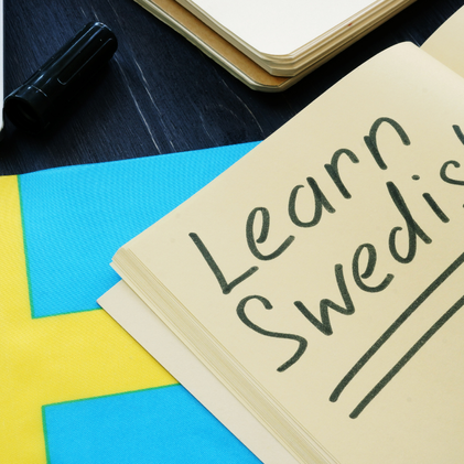 A book about learning Swedish with a Swedish flag
