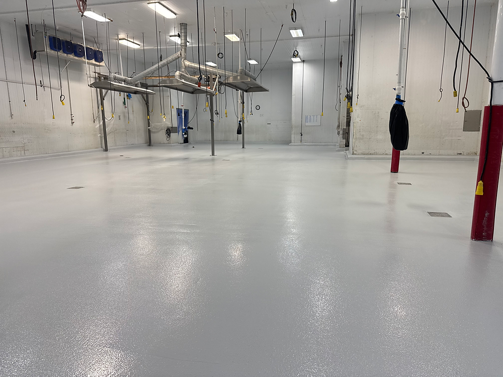 Empty processing room with a clean, reflective floor
