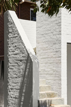 Elwood Stair Detail rendered brick crazy paving