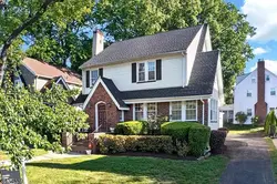 Classic Colonial with a timeless brick facade blending character with flexibility.