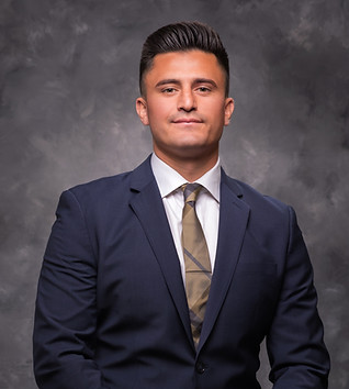 Anthony Romano in a suit and tie posing Fortress Mortgage Advisors