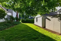 Great curb appeal, driveway, and attached garage.