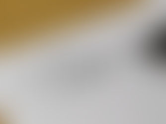 A pen looking like it is writing on a page of white paper with the word Dear on it