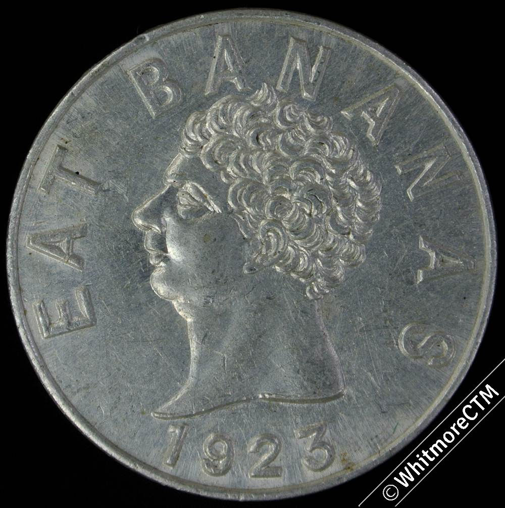 Advertising Token 1923 Eat Bananas. all food fruit. Cruciform shields Alum 29mm