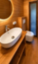 Bathroom at Casa Simple, a wooden cabin for simple shared living at a yoga retreat.