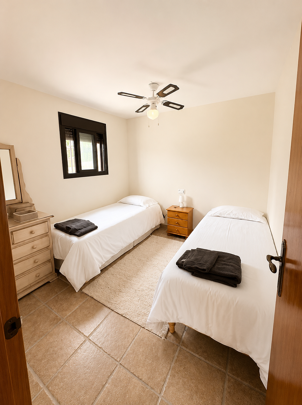 Twin share room with two single beds at Casa Verde, Maria Leona Retreats in Andalusia, Spain.