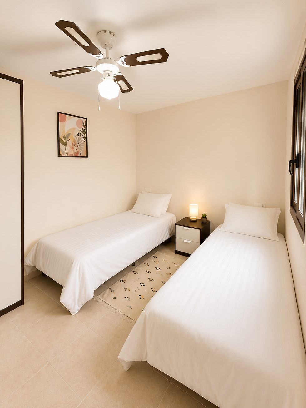 Twin bedroom with two single beds at Casa Azul, Maria Leona Retreats in Andalusia, Spain.