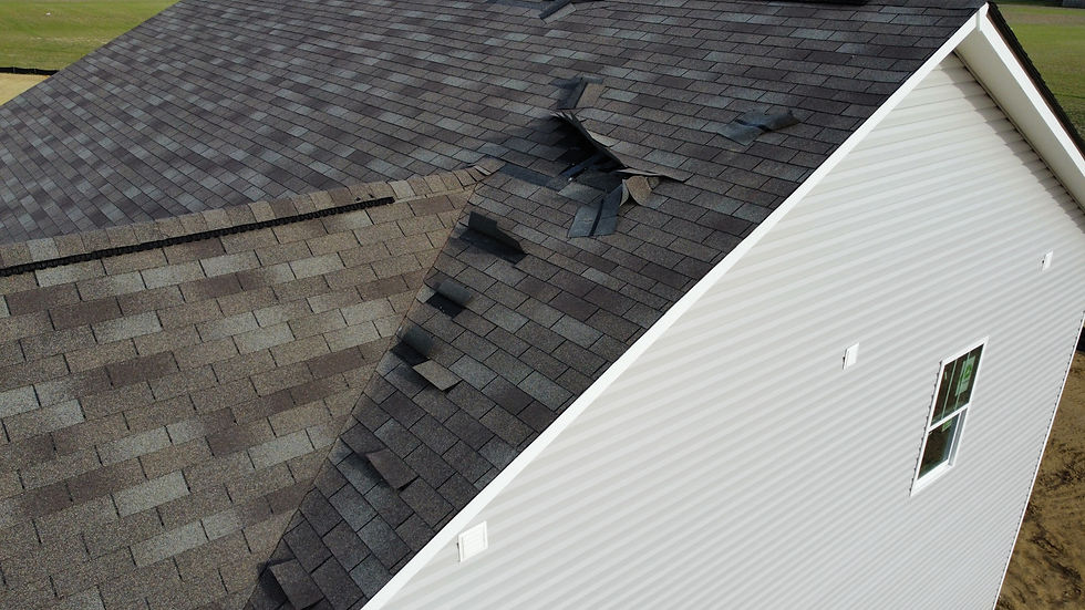 Missing shingles on Indianapolis home after wind damage