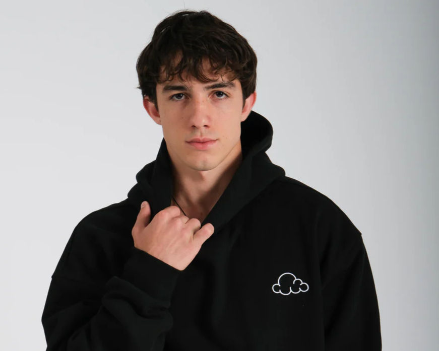 Teen boy wearing a Cloud Hoodie from Cloud Nine