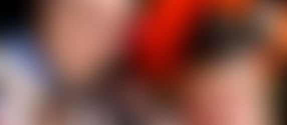 Daddying blog editor Scott Beller and Daddying Film Fest Founder Allan Shedlin pose in colorful outfits at the Mummers Museum in Philadelphia.