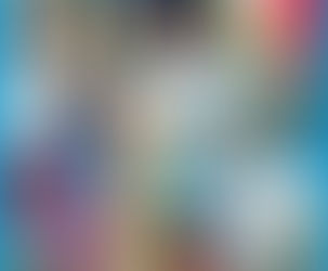 A wall of banned books with cover artwork to read to and with your kids.