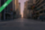 A road between buildings leading into the distance