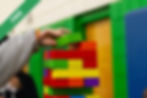 A person piling blocks