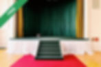 An empty stage with curtains