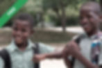 Two smiling boys in uniform