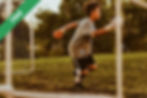 A boy playing football
