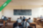 People sitting at desks in a classroom