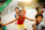 A group of children laughing together