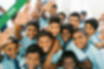A group of children taking a picture together