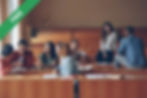 Students talking in a lecture hall classroom