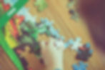 A boy playing with a puzzle