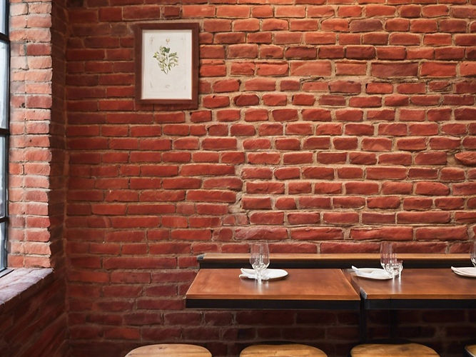 old red bricks on the interior wall of a restaurant.jpg
