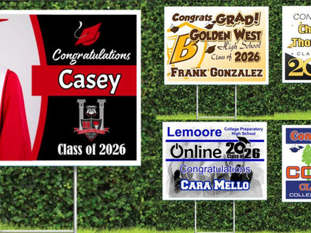 Multiple different schools in the South Valley represented on graduation yard signs