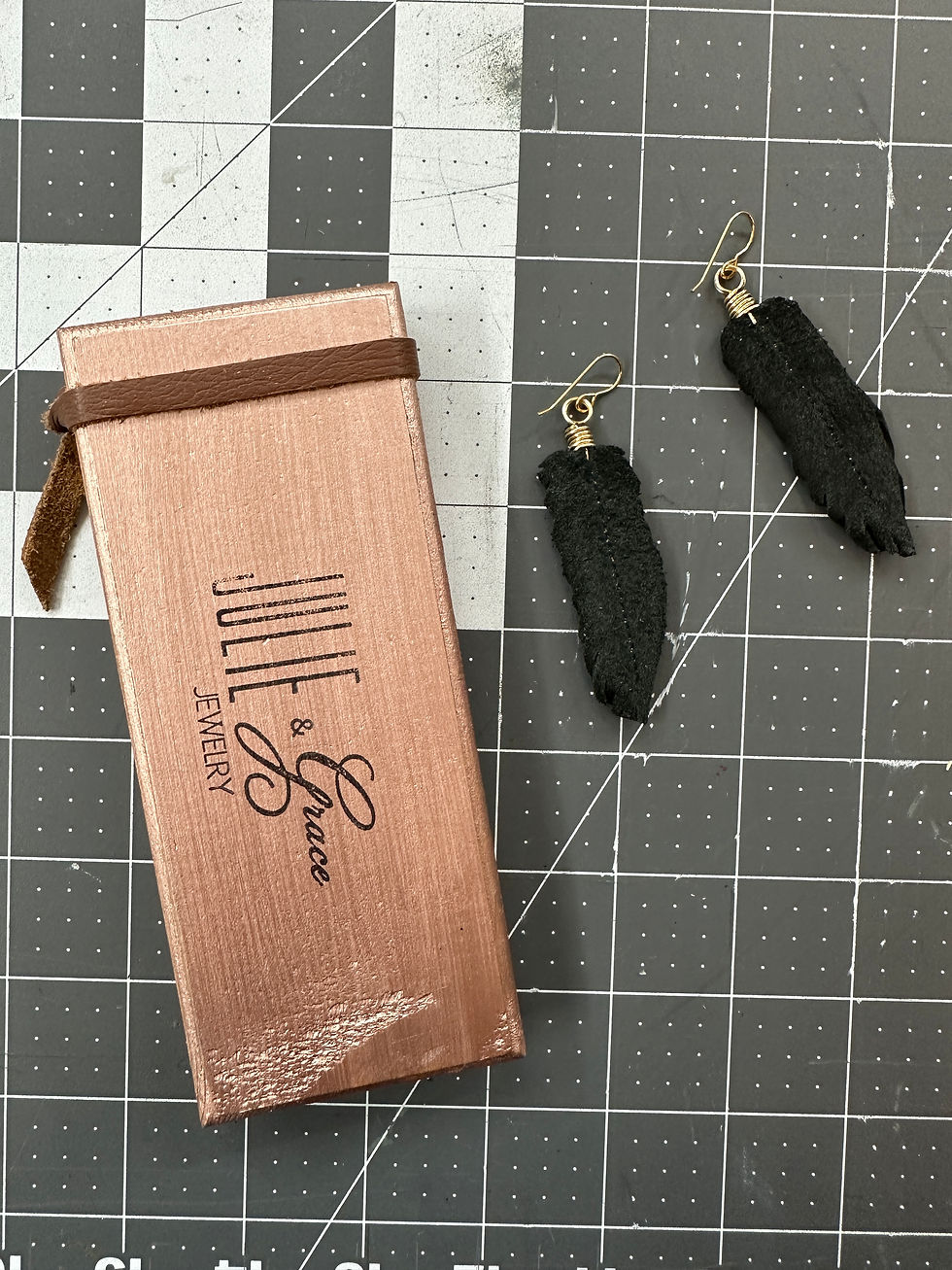 Thumbnail: Stunning Leather Feather Earrings with Gold Wire