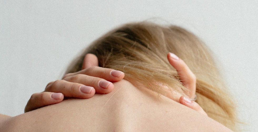 woman covering her breast with her hand_edited.jpg