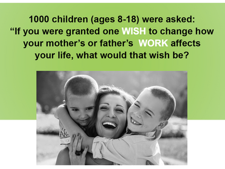 Mom laughing and hugging two boys