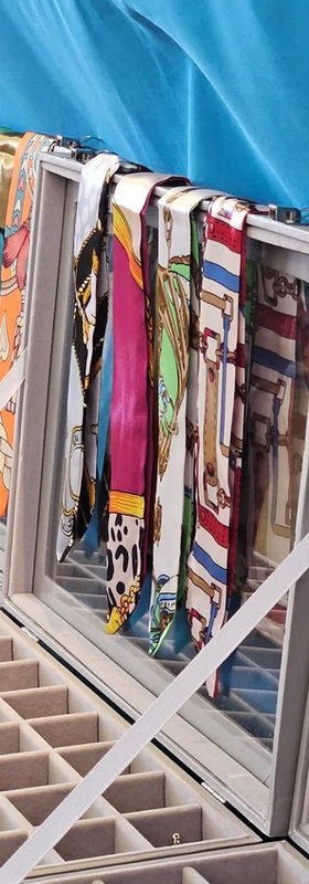 Our Twilly Charm Collection pairs vibrant twilly scarves with customizable charms. Mix, match, and style your way — no two looks are the same.