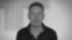 Black and white headshot of a man