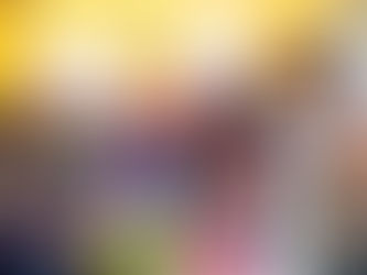 A classroom full of Children at Better Days Primary School having their eyes closed as their teacher stands by leading them in prayers during the Tuesday gatherings.