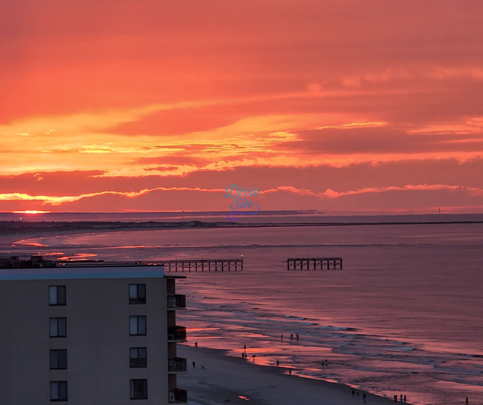 Eye-level view of a coastal sunset
