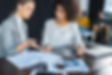 multicultural-businesswomen-talking-about-document-2022-01-18-23-57-58-utc.jpg