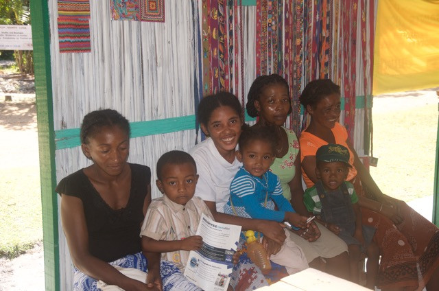 Stitch embroiderers with children