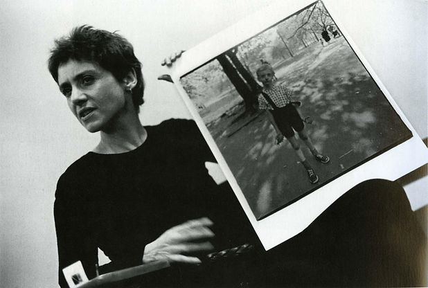 diane_arbus_with_her_photo_of_a_boy_holding_a_toy_grenade_in_central_park_ny_1970_stephen_
