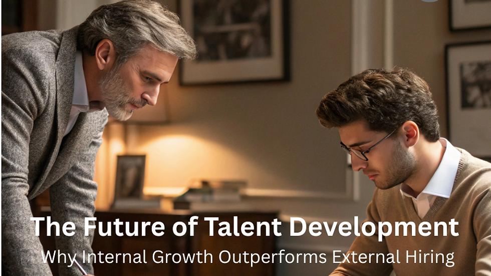 Senior executive mentoring a young professional in a leadership development meeting, illustrating internal talent growth strategy in a modern workplace setting