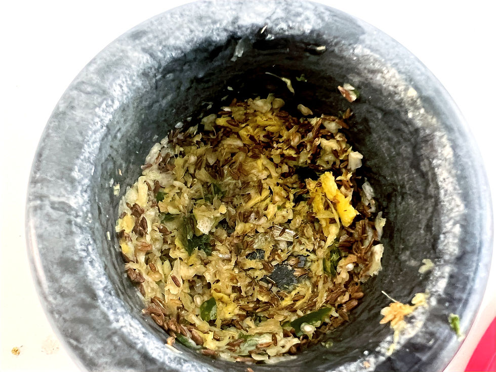 Ground Ginger Garlic Chillies in a mortar