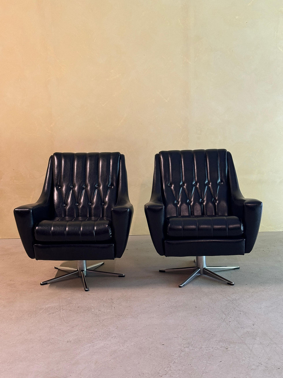 Thumbnail: Vintage pair of Black leather Swivel Easy Chairs