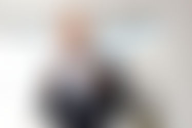 Blond businessman happy expression