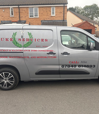 Duke Services Van Sign written