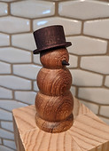 Leopardwood and African blackwood snowman figurine